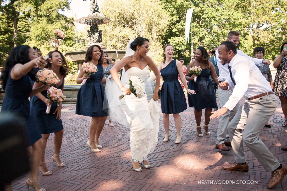 Bride dances in public at Bethesda Fountain next to Boathouse by: Heathwood Photo