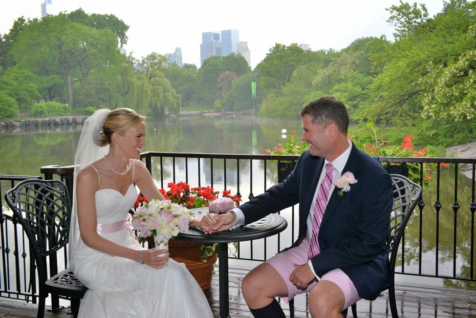 Bride and groom at the table on the terrace by: Steve Worth Photography