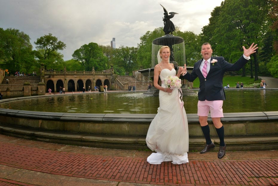 Groom jumping in front of Bethesda Fountain before Boathouse reception by: Kira Yustak