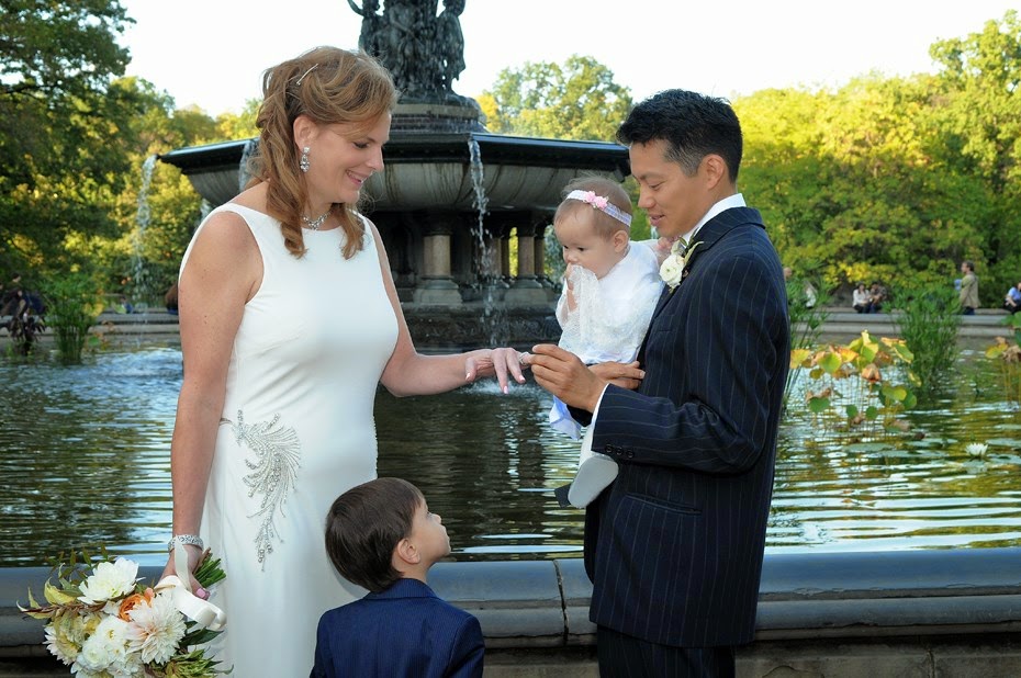 Kimberly and Victor during the ceremony outside the Boathouse by: Kira Yustak