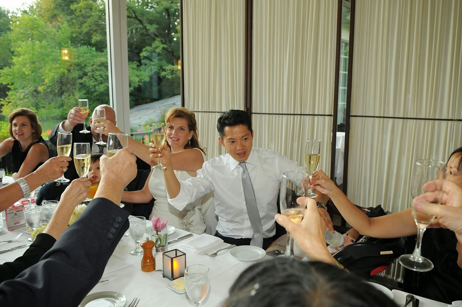 Kimberly and Victor toast with guests by: Kira Yustak