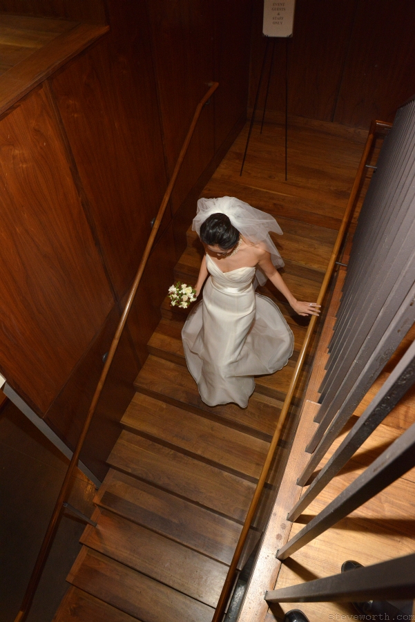 Carol walking downstairs for first look by: Steve Worth Photography