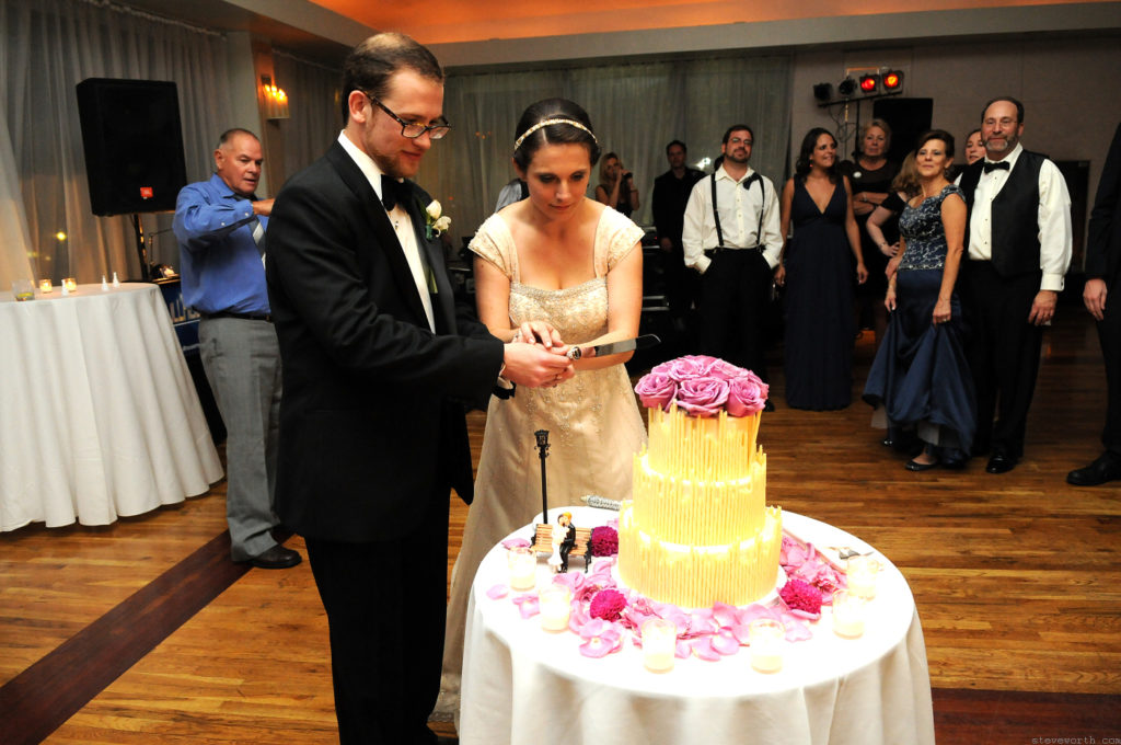 Rebecca and Ben Cut their Cake by: Kira Yustak