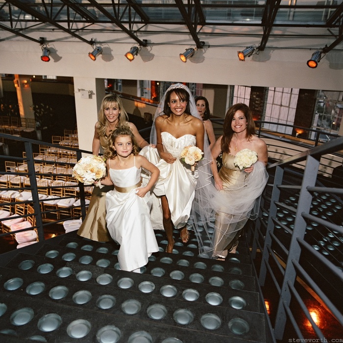 Bride and Bridesmaids on Palladium Steps at Tribeca Rooftop Wedding by: Steve Worth Photography