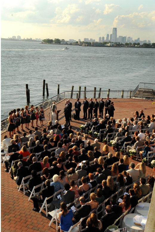 Outdoor Ceremony in Progress – View from Balcony by: Kira Yustak