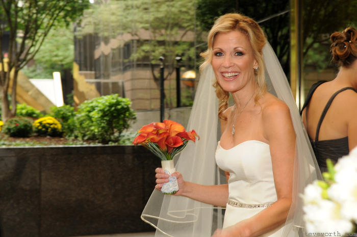 Laura leaving her apartment with her bouquet by: Kira Yustak