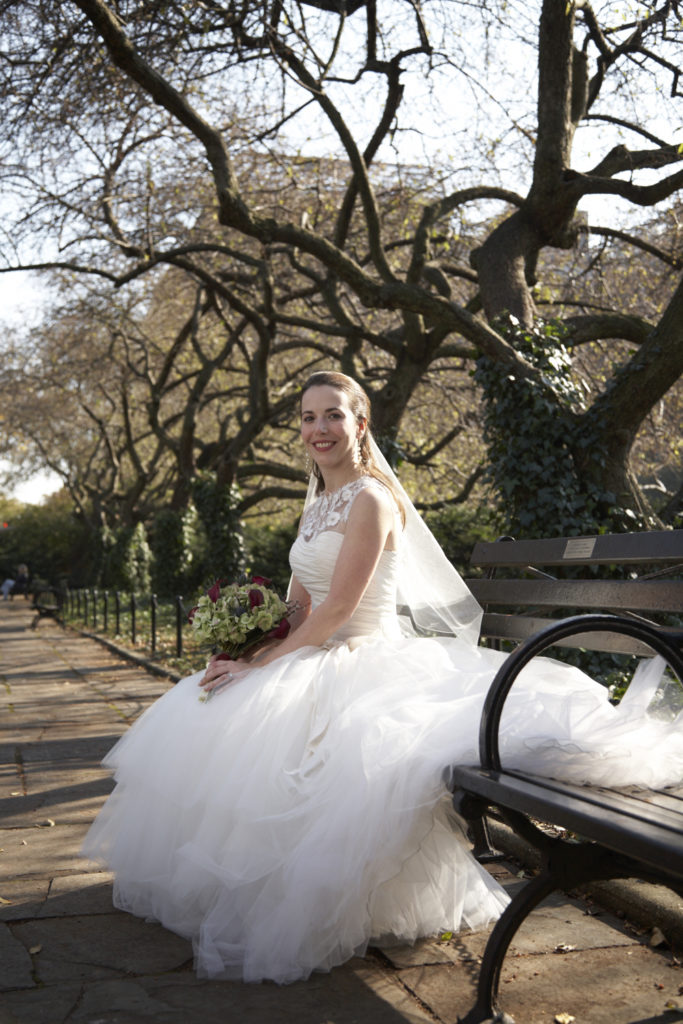 Bride on a bench at the Conservatory Garden, Central Park. by: Windsor Photo NYC
