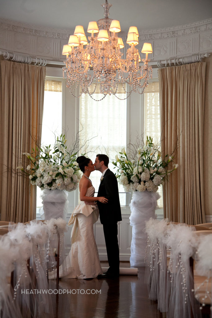 Bride and Groom alone together in ceremony space by: Heathwood Photo