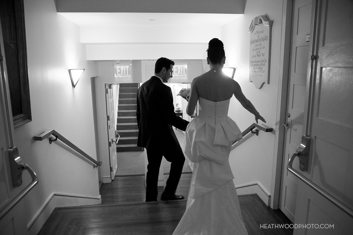Bride and groom rush from the altar to the bridal suite to be alone a moment by: Heathwood Photo
