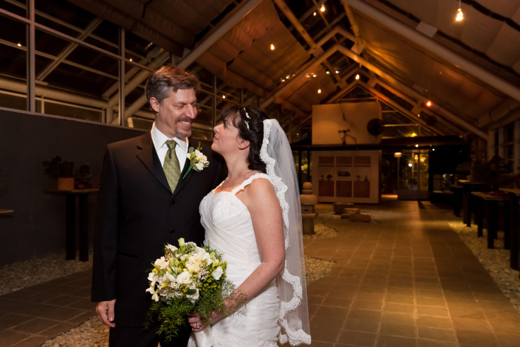 A moment of love in the desert room at the Gardens by: Robert London Photography