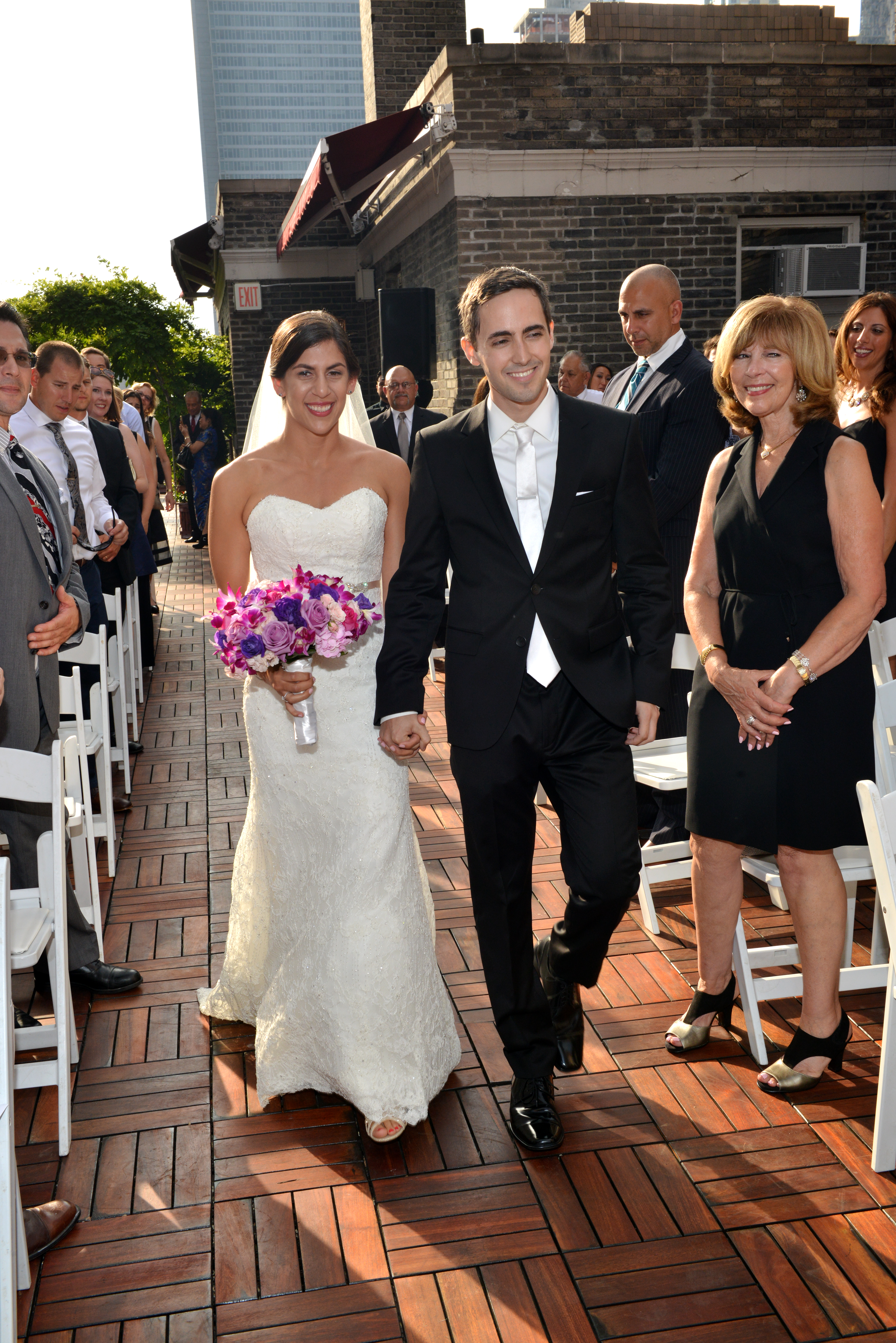 Walking down the Aisle on the Rooftop by: Steve Worth Photography