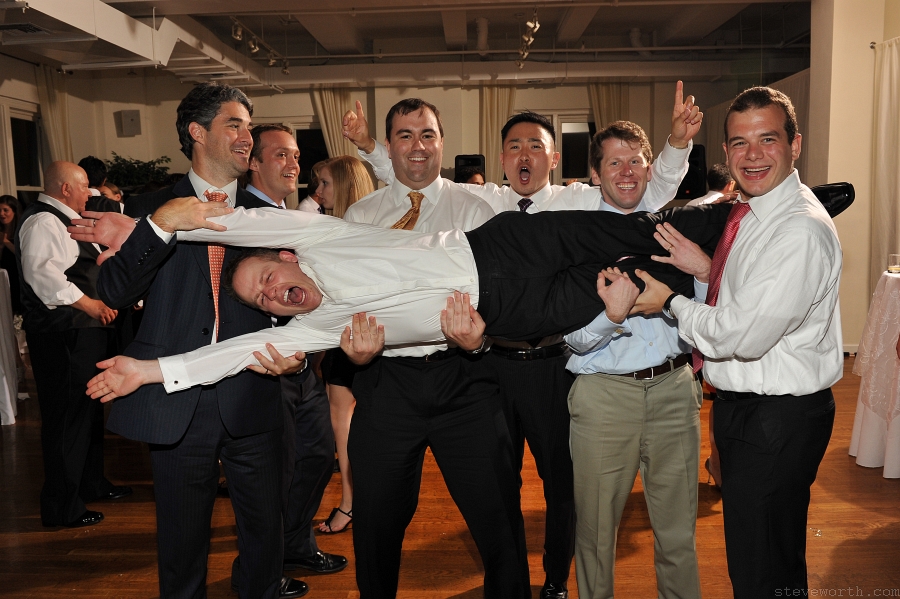 Guys Lifting the Groom by: Steve Worth Photography