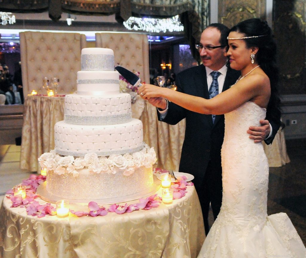 Cutting their Cake by: Kira Yustak