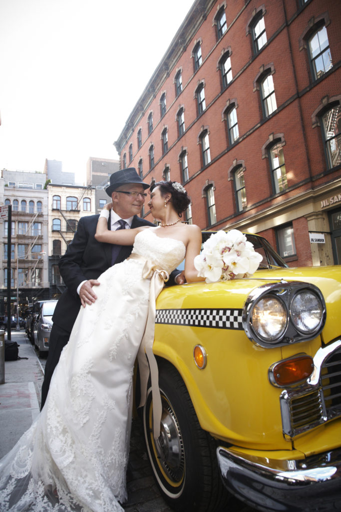 Bride and groom with vintage cab. by: Windsor Photo NYC
