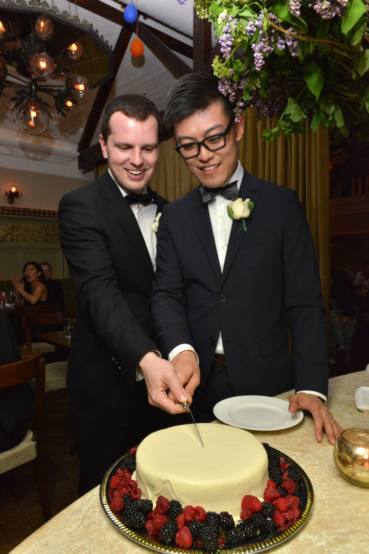 Steven and Ray Cutting the Cake by: Steve Worth Photography