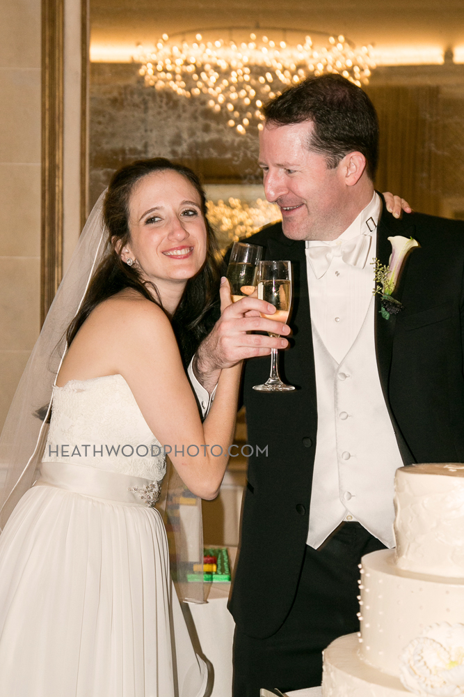 Bride and Groom champagne toast, cake cutting by: Heathwood Photo