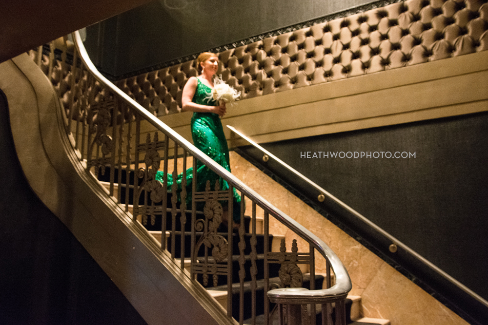 Bride descends stairway procession by: Heathwood Photo