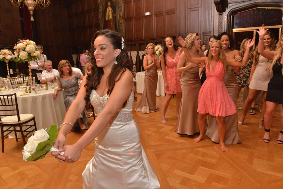 Bouquet Toss in Castle Ballroom by: Steve Worth Photography