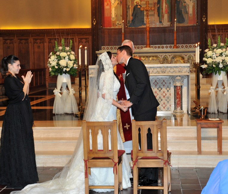 Kiss during Ceremony by: Steve Worth Photography
